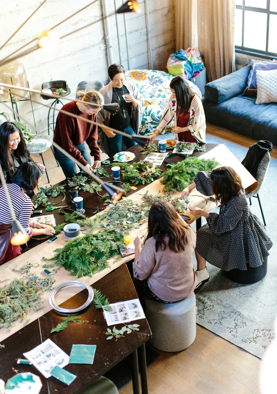 Guests gathered around a welcoming event table