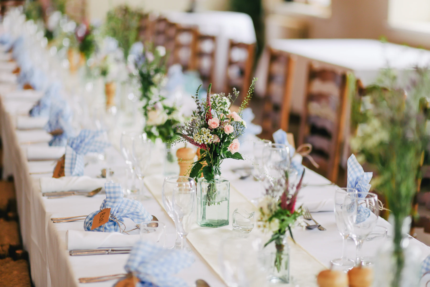 Elegant celebration table with flowers and glassware